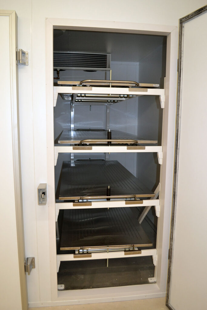 Mortuary rack and trays inside a coldroom